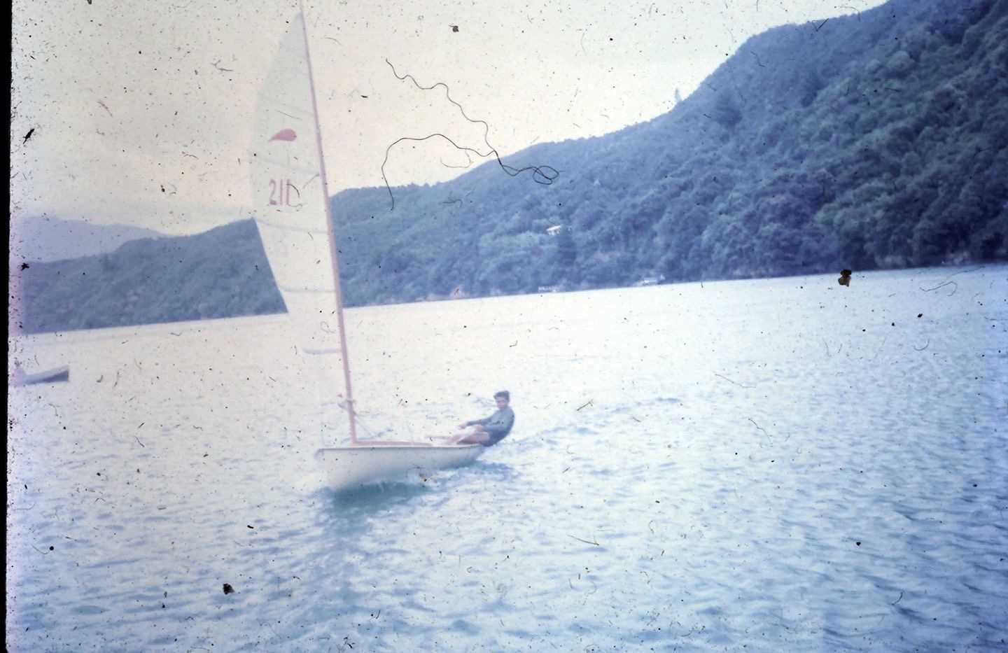 Chris Hargreaves, aged 11, sailing a Zephyr in Lochmara Bay in 1963